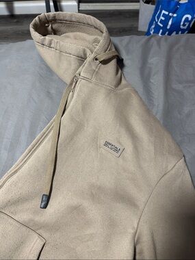 Essentials Beige Zip-Neck Hoodie with Patch Logo